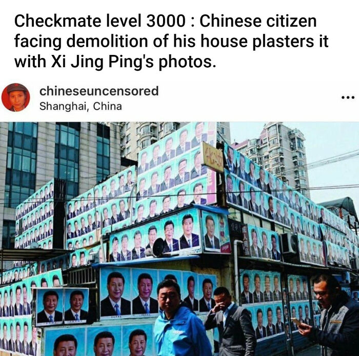A building covered in Xi Jing Ping photos, a mad lad's challenge against demolition in China.