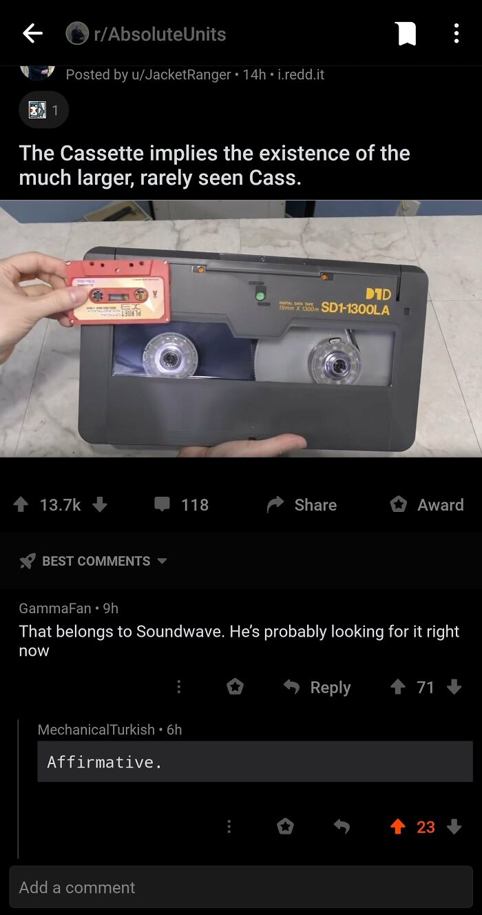 A small cassette tape held next to a giant data storage tape, highlighting comments you can hear.