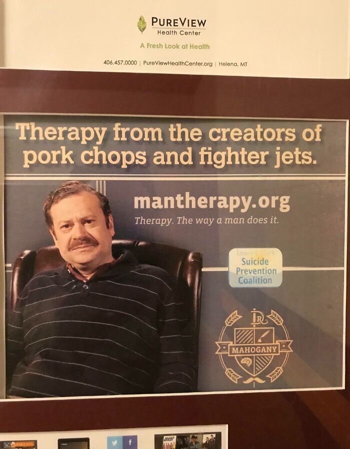A man sitting in a chair, posing for a Man Therapy ad, addressing fragile masculinity.