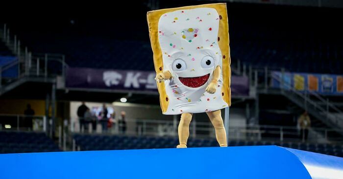A person in a disturbing Pop-Tart mascot costume with an awkward smile, a design fail at an event.