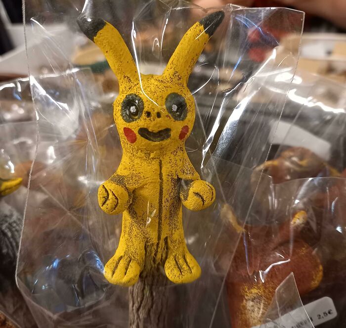 Uncomfortable design fails: a creepy, distorted Pikachu figure.