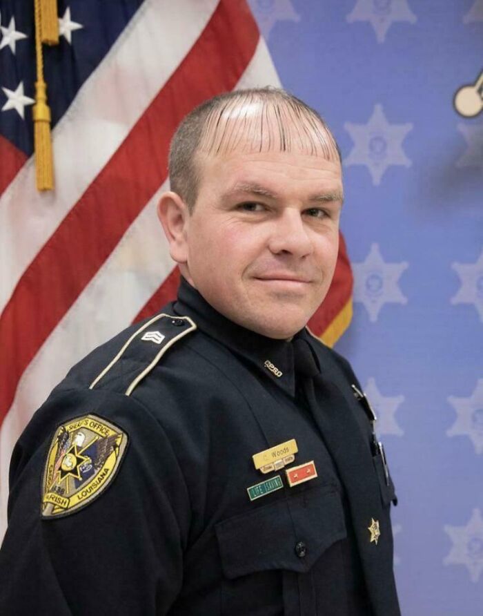 A police officer with an unusually short fringe. This is one of the worst haircuts shared by the community.