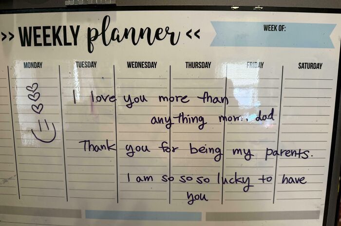 A weekly planner with a handwritten note about adoption, expressing love and gratitude to mom and dad, part of adoption stories.