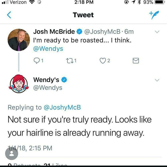 A screenshot of a Twitter exchange where Wendy's delivers a savage burn about Josh McBride's hairline.