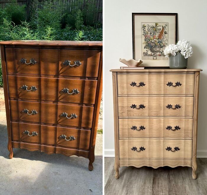 Revived old piece of furniture, a wooden dresser, lightened to a natural wood tone, with dark pulls.