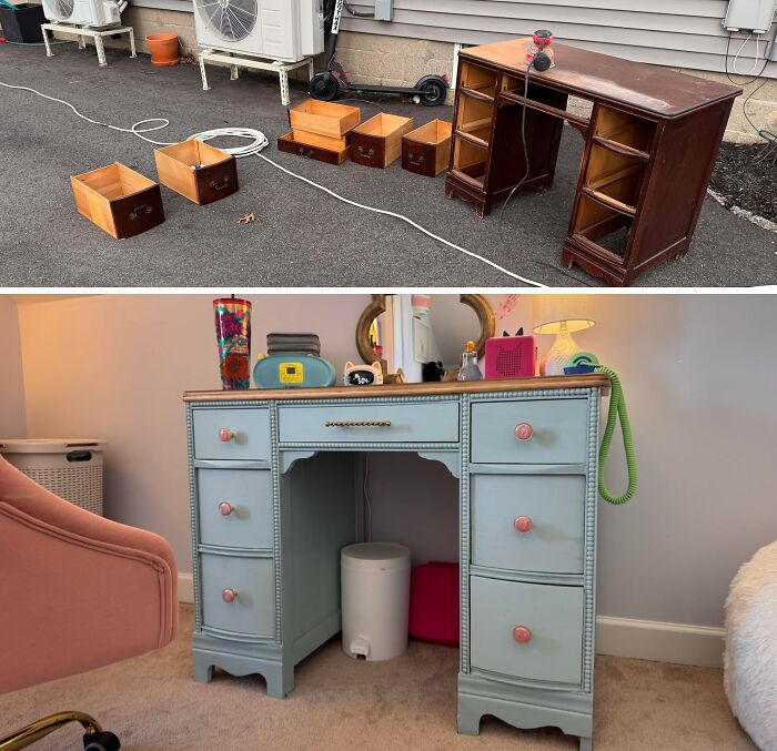 An old piece of furniture, a wooden desk, transformed into a light blue vanity with pink knobs.
