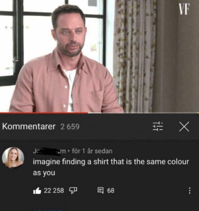 A YouTube comment with a savage burn about a man's shirt matching his skin tone.