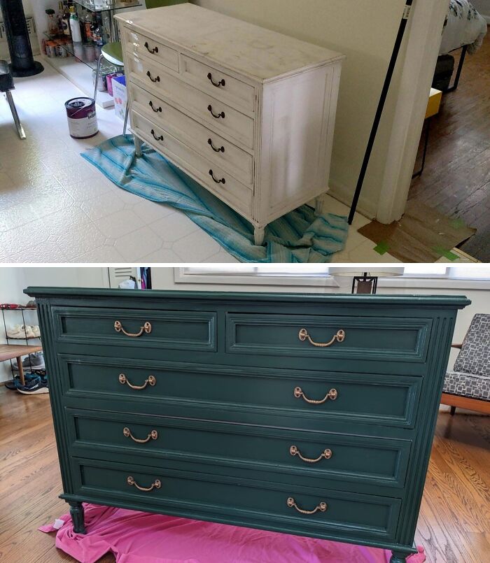 Revived old piece of furniture: a white dresser painted dark green with new handles, showing its potential and revival.
