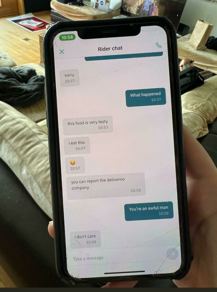 A smartphone screen displaying a chat about a delivery fail where the rider ate the food.