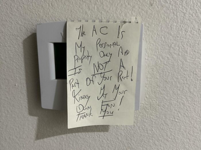 A handwritten note from a horrible landlord stating the AC is their personal property and not part of rent.