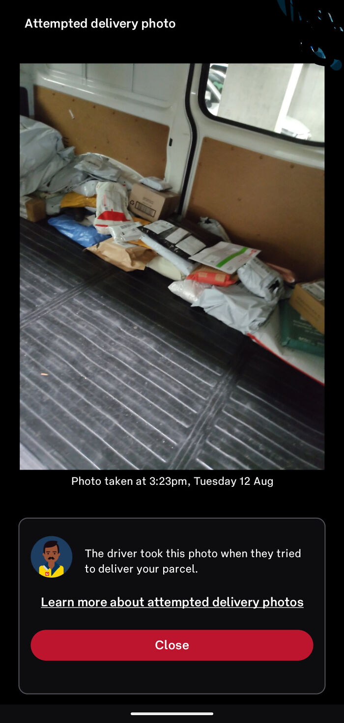 A screenshot of an attempted delivery photo showing a van full of unorganized packages, a clear delivery fail.
