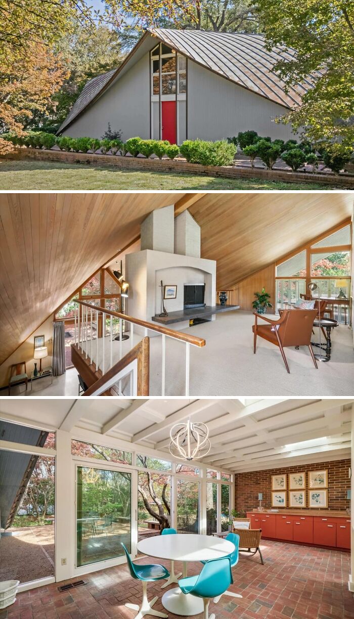A modern cool A-frame house with a striking red door and a distinctive roofline, set amidst a well-maintained garden.