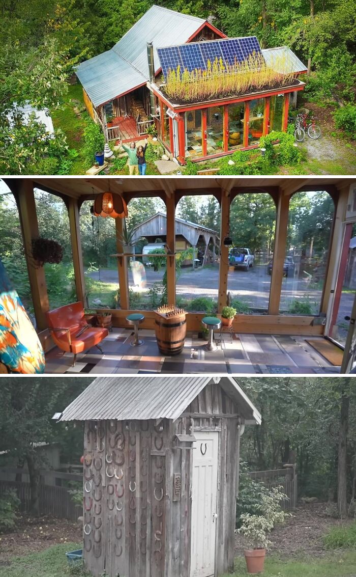 Aerial view of a cool, unusual home with solar panels and a living roof, surrounded by lush trees, showcasing unique architecture.