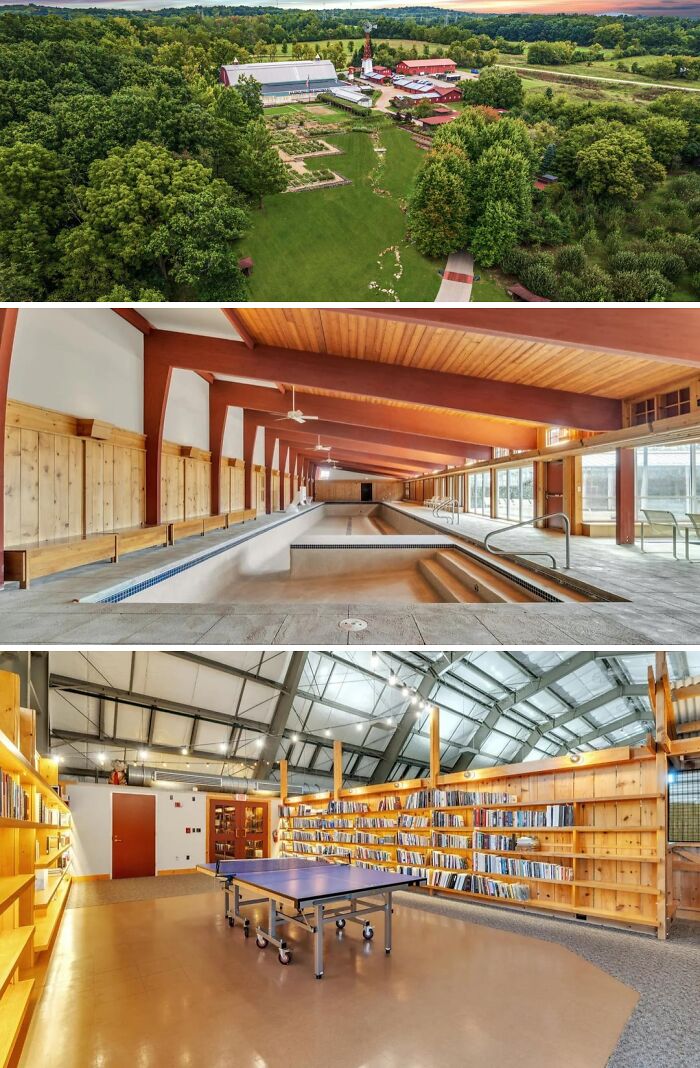An aerial view of an unusual home surrounded by trees and fields, featuring a long indoor pool and a large library with a ping-pong table.