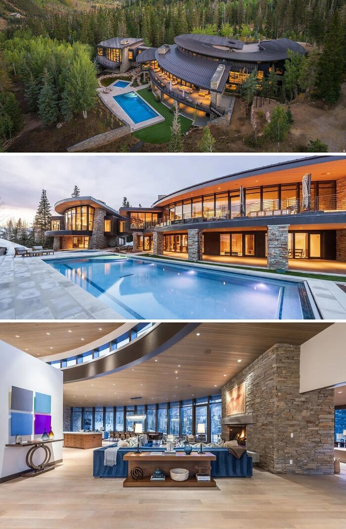 A luxurious, cool home nestled in a forest, featuring a large outdoor pool and modern architectural design.