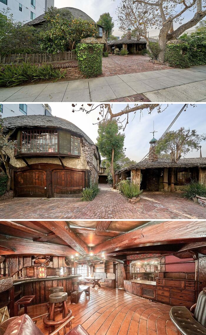 A unique, quirky home resembling a hobbit house, featuring a wooden door and a whimsical, unusual exterior. This cool home stands out.
