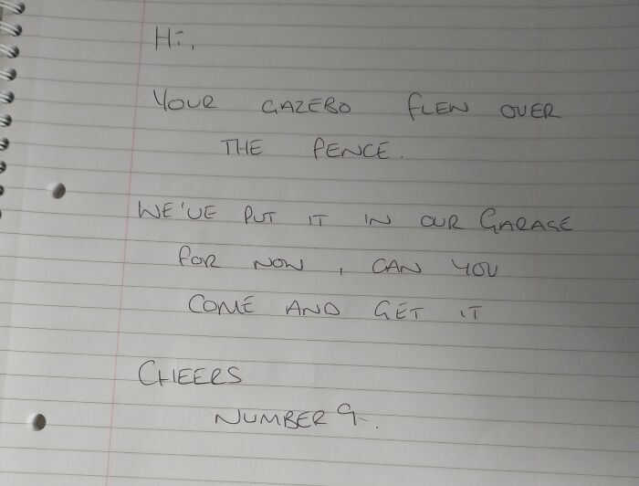 A funny neighbor note on lined paper informing a neighbor their gazebo flew over the fence and is in a garage.