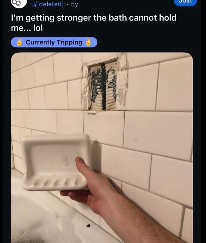 A funny image of a person holding a soap dish next to a broken bathroom wall. One of 62 random posts.
