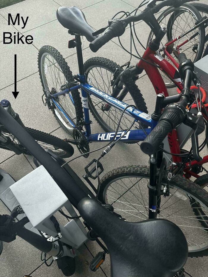 An image showing multiple bikes, one labeled 'My Bike' with an arrow pointing to a blue Huffy, highlighting disregard for basic human decency through poor parking.