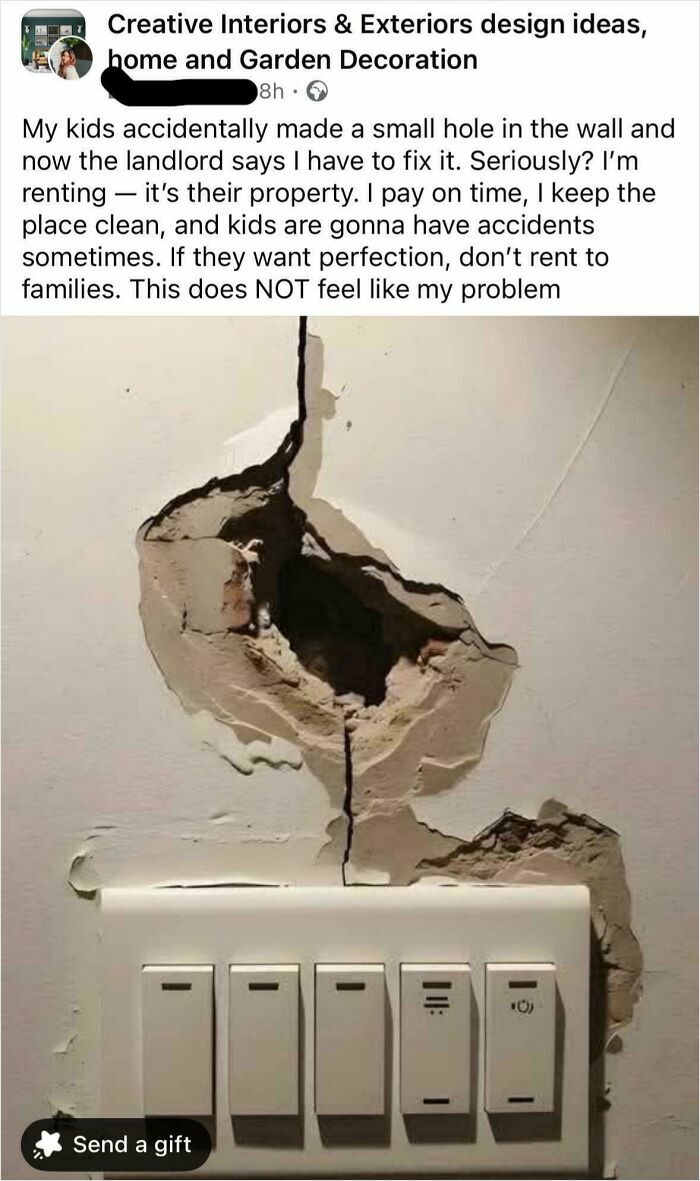A large hole in a wall above light switches, illustrating a lack of basic human decency in property care.