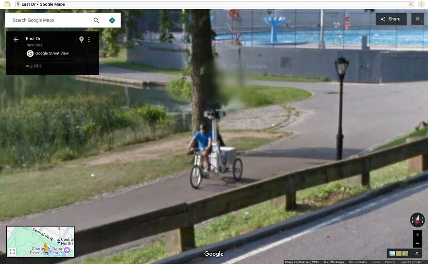 A person on a tricycle with a camera capturing a Google Street View in a park.