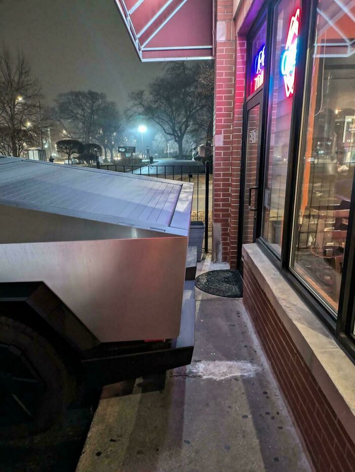 A Cybertruck parked blocking a sidewalk, showing a lack of basic human decency.