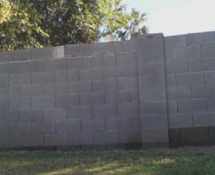 A brick wall with an unexpected element, making it a clever when you see it picture.