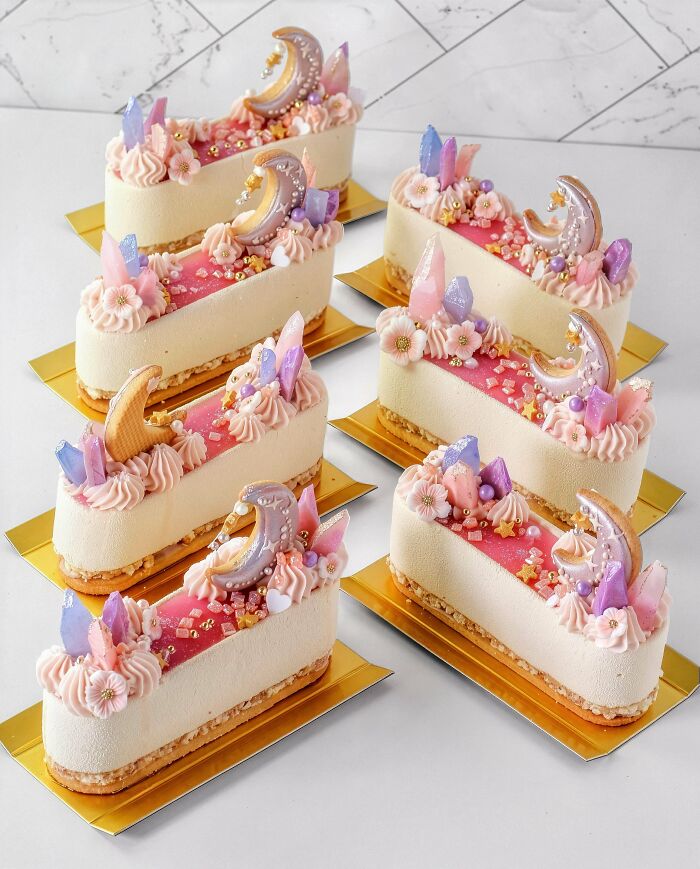 Several elegant individual cakes with moon and crystal decorations, reflecting bakers amazing and delicious treats.