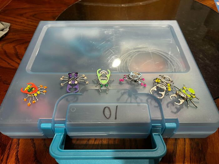A collection of colorful insect figures, representing unexpected things people made out of things that would’ve been thrown away.
