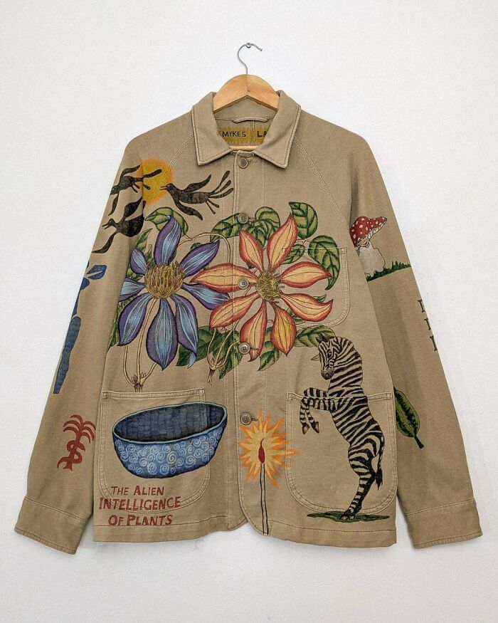 A jacket with various painted designs, unexpected things made out of things that would've been thrown away.