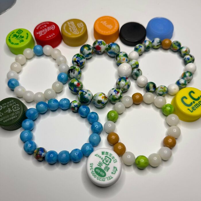 Colorful beads and bottle caps, unexpected things made out of things that would've been thrown away.