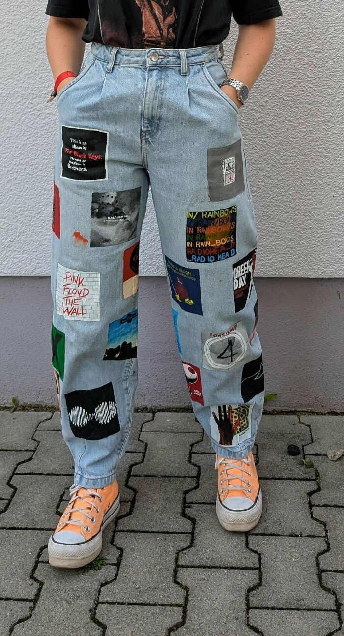 Colorful, custom-painted sneakers demonstrating how people made things out of thrown away or old shoes.
