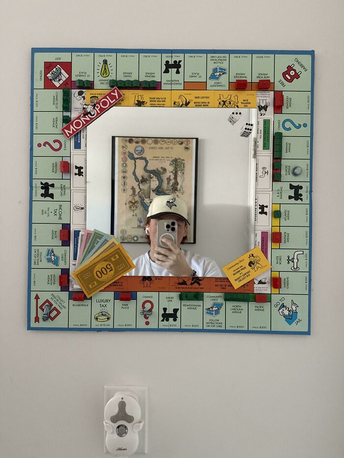 A person made a Monopoly board mirror, repurposed from things that would've been thrown away.
