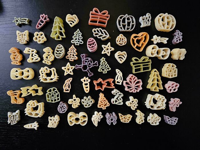 An unexpected collection of various shaped pasta in different colors, showcasing an interesting and fascinating variety.