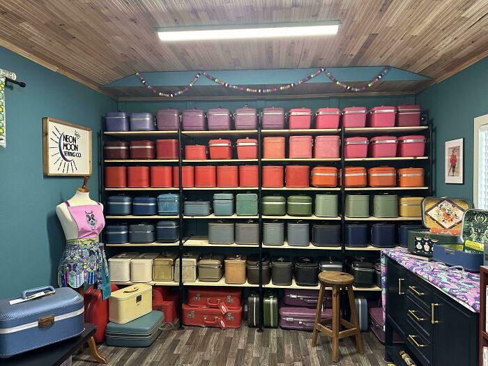 A room filled with colorful vintage lunchboxes, a display of fascinating collections.