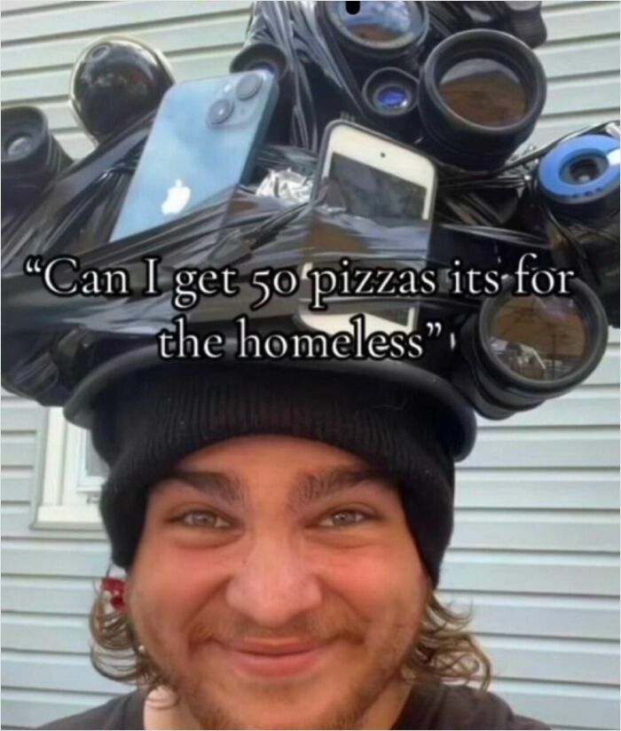 A man wearing a beanie and a bizarre hat made of cell phones and other objects, representing a cringe image.