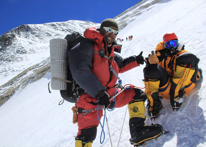 Climbers on Mount Everest, an example of the thousands who passed Green Boots, a frozen body, for 30 years.