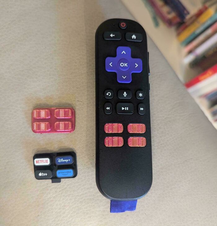 Functional 3D prints enhancing a remote control, making everyday life much easier.