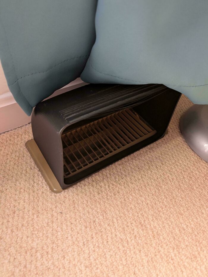 A functional 3D print of an air vent redirection cover, making everyday life more comfortable.