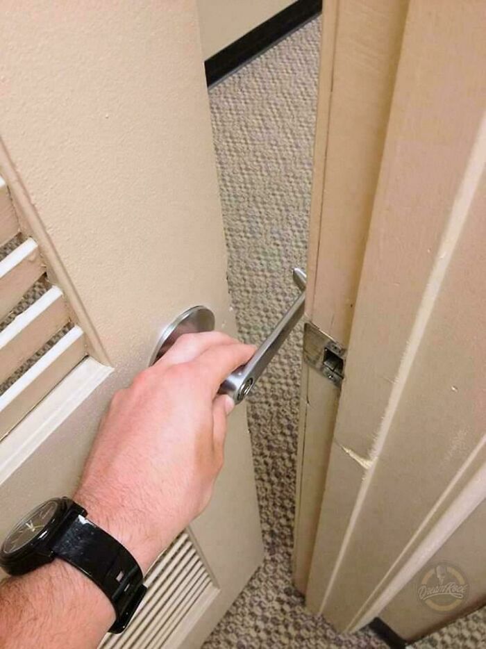 A door handle hitting the door frame due to incorrect installation, highlighting a 'You Had One Job' fail.