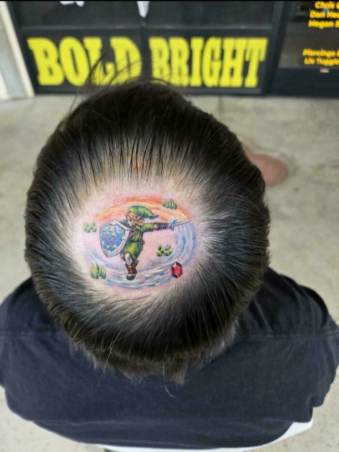 A tattoo artist's talent is wasted on a questionable tattoo idea of Link from Zelda on a person's scalp.
