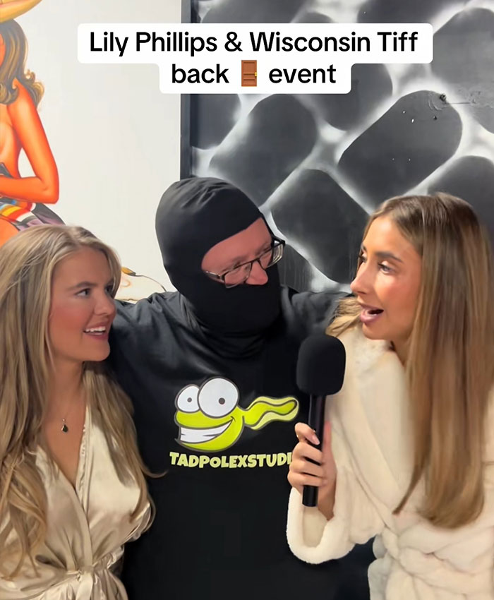 Lily Phillips and Wisconsin Tiff interview a masked man at a Backdoor Challenge event.