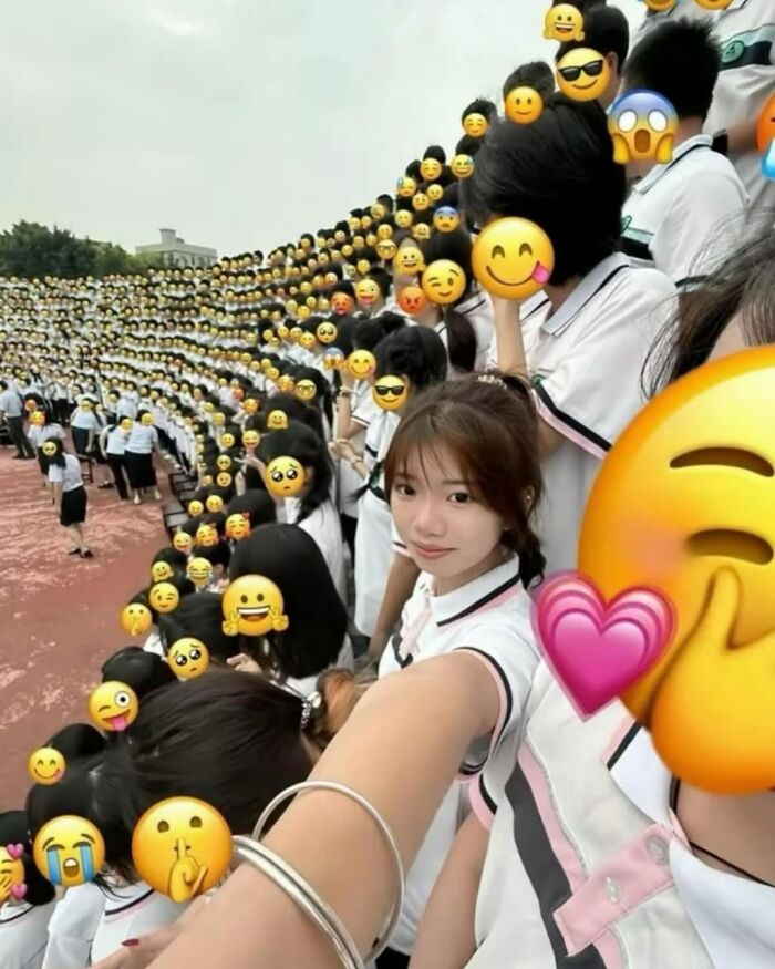 A Girl Placed Stickers On All Her Classmate's To Respect Their Privacy Before Posting Her Graduation Photo
