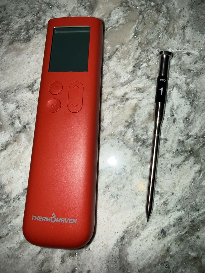 A red ThermoMaven meat thermometer and probe, an excellent last minute Fathers Day gift for grill masters.