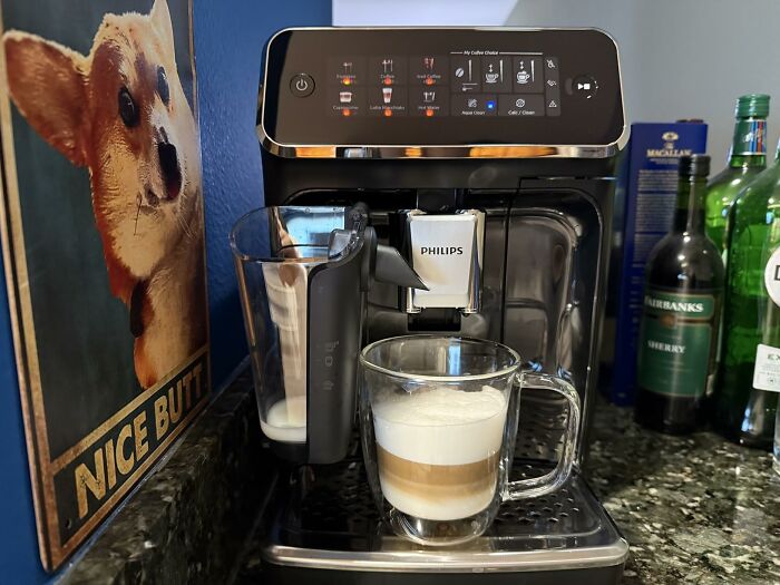 A Philips espresso machine making a latte macchiato. This home and kitchen find is worth the counter space.