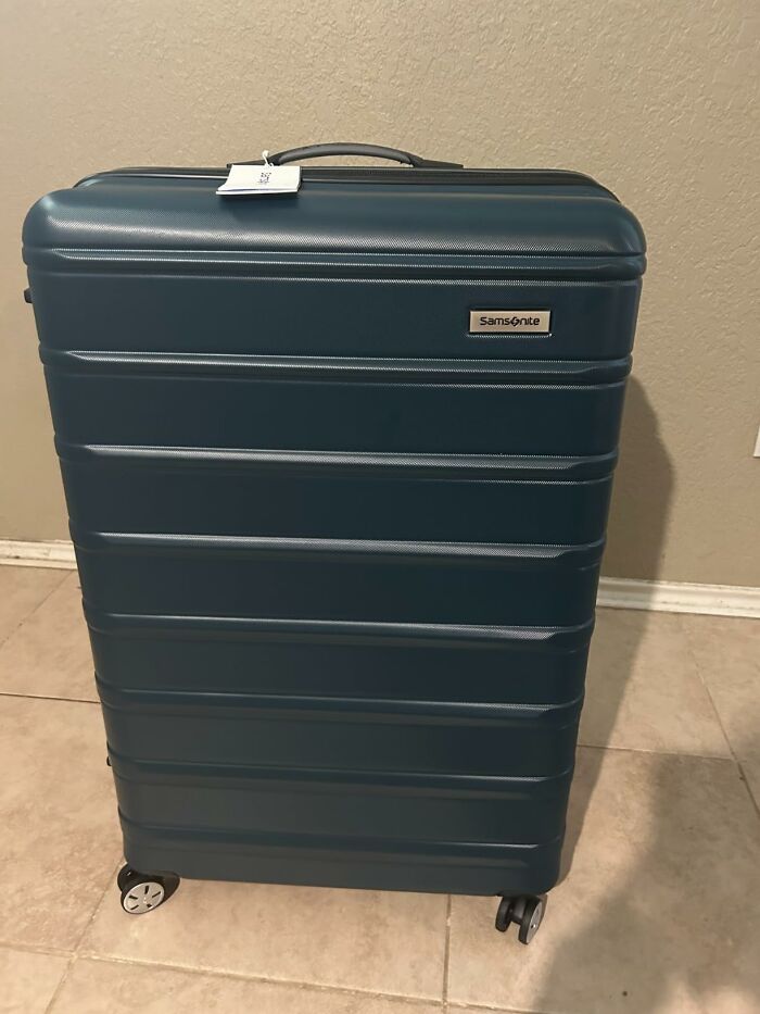 Samsonite hard shell suitcase in teal, a great Prime Day Deal for travel.