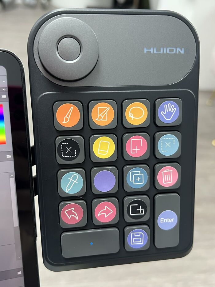 A Huion shortcut keypad with colorful buttons, a great Prime Day electronics deal for artists.
