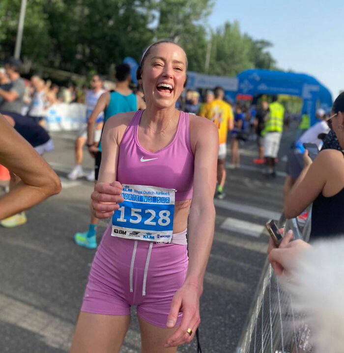 Amber Heard smiles after a run in her new country, enjoying her new life and changing her name. Amber Heard smiles after a run in her new country, enjoying her new life and changing her name.