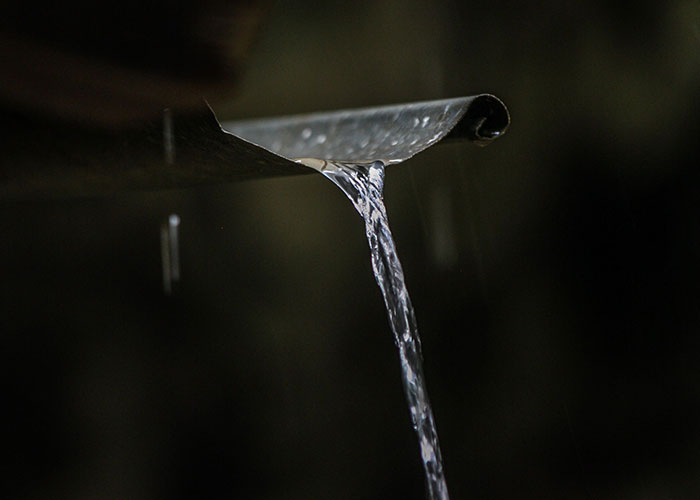Water flowing from pipe, legal offense environmental violation