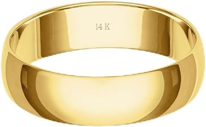 Close-up of a 14K gold ring representing a symbolic gift after divorce